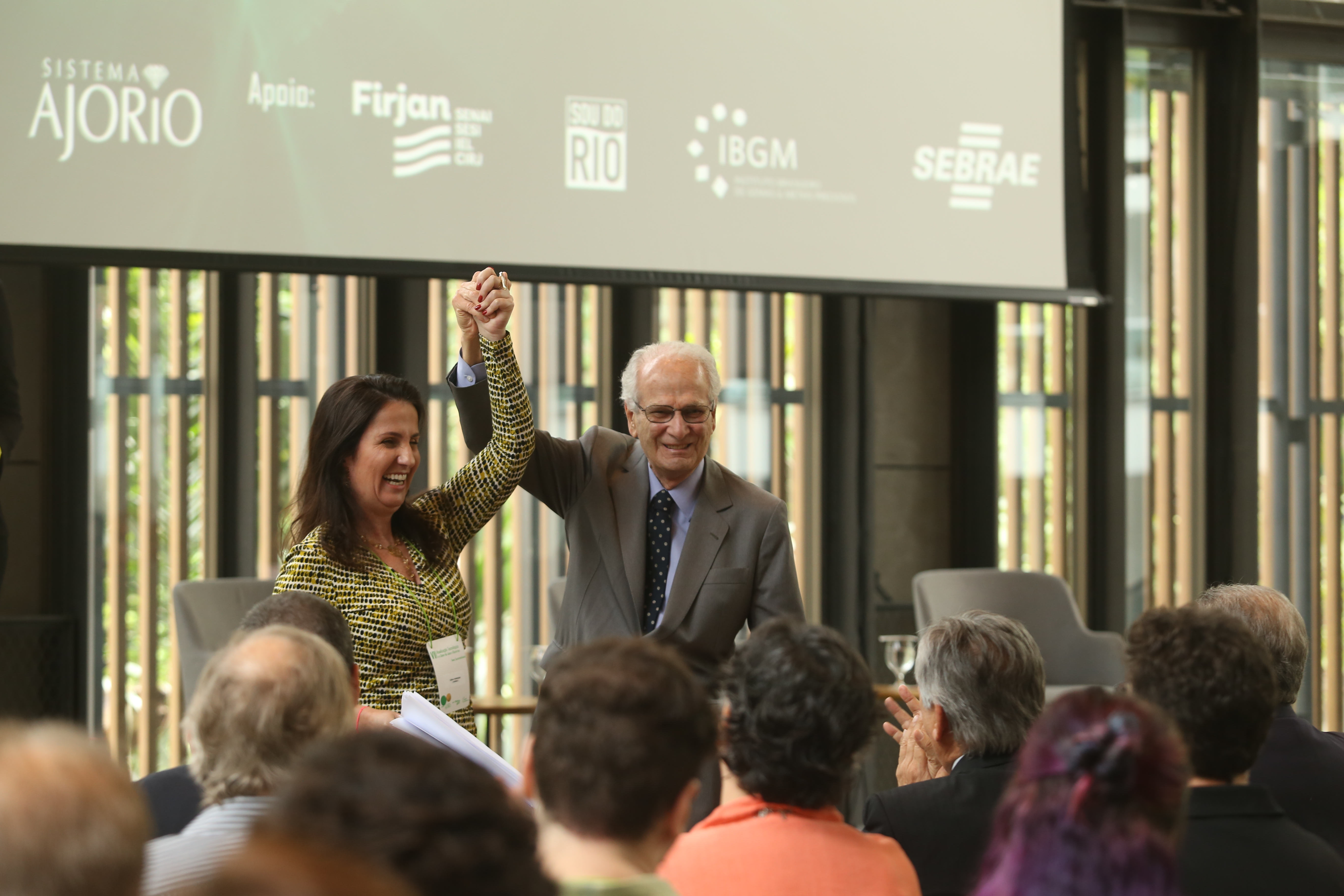 Carla Pinheiro presidente do sistema Ajorio e Eduardo Eugênio Vieira presidente da Firjan1